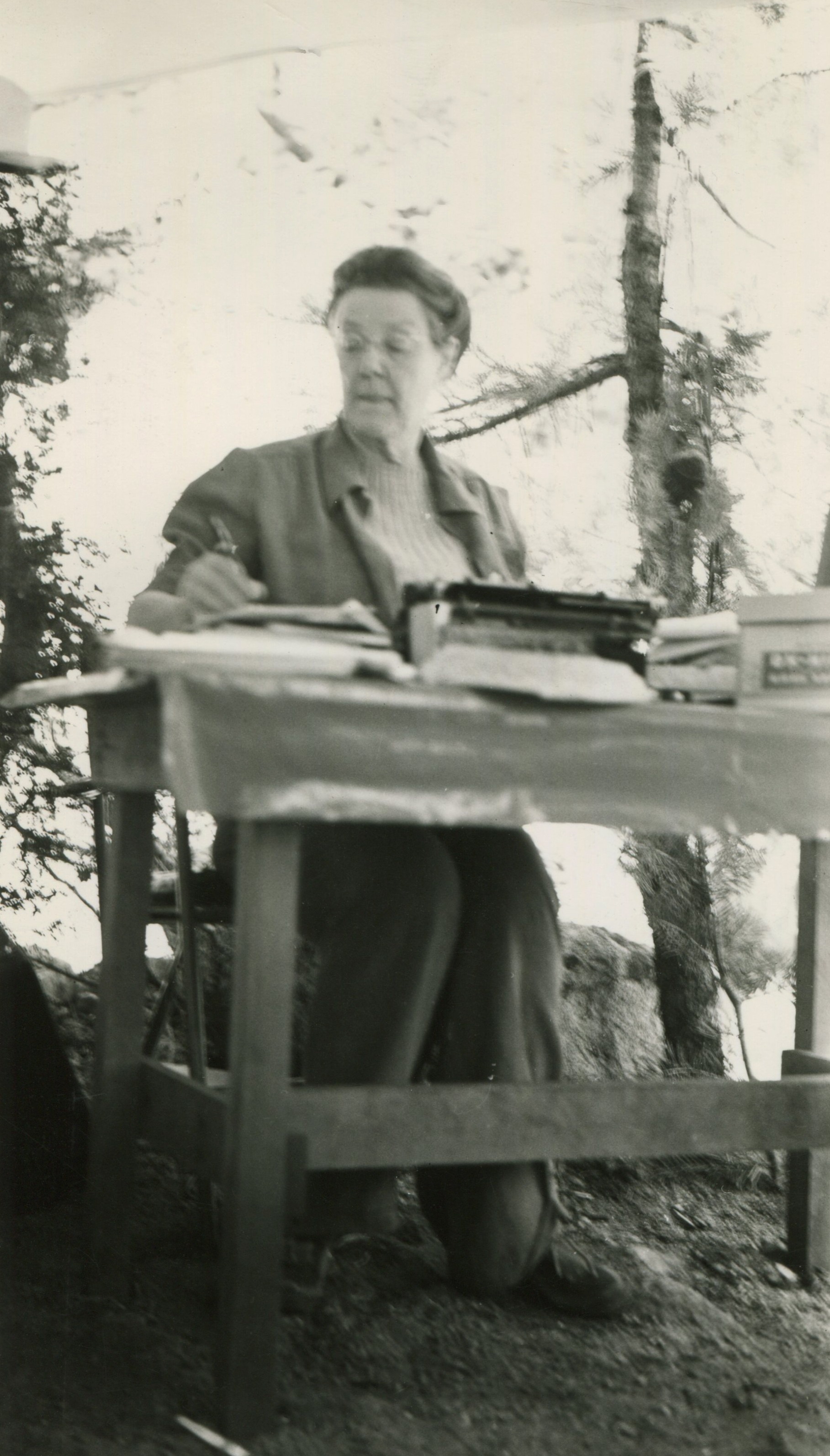 1941 Ashrama camp - Sherifa at camp desk