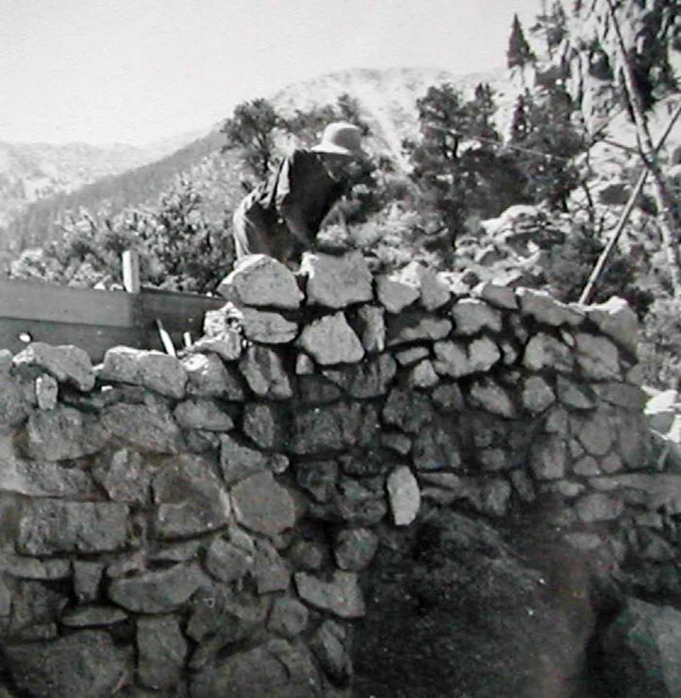 1942 Ashrama camp - Franklin working on wall